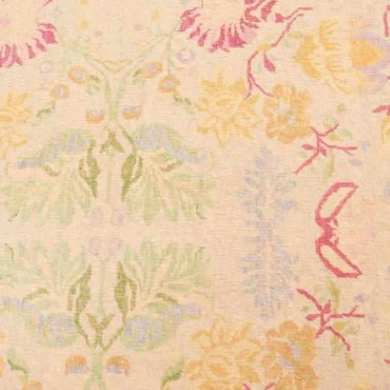 First half 20th c., hand knotted pastel wool rug, possibly Agra. All-over foliage design in delicate pastel colors, low pile woven wool, approx. 181