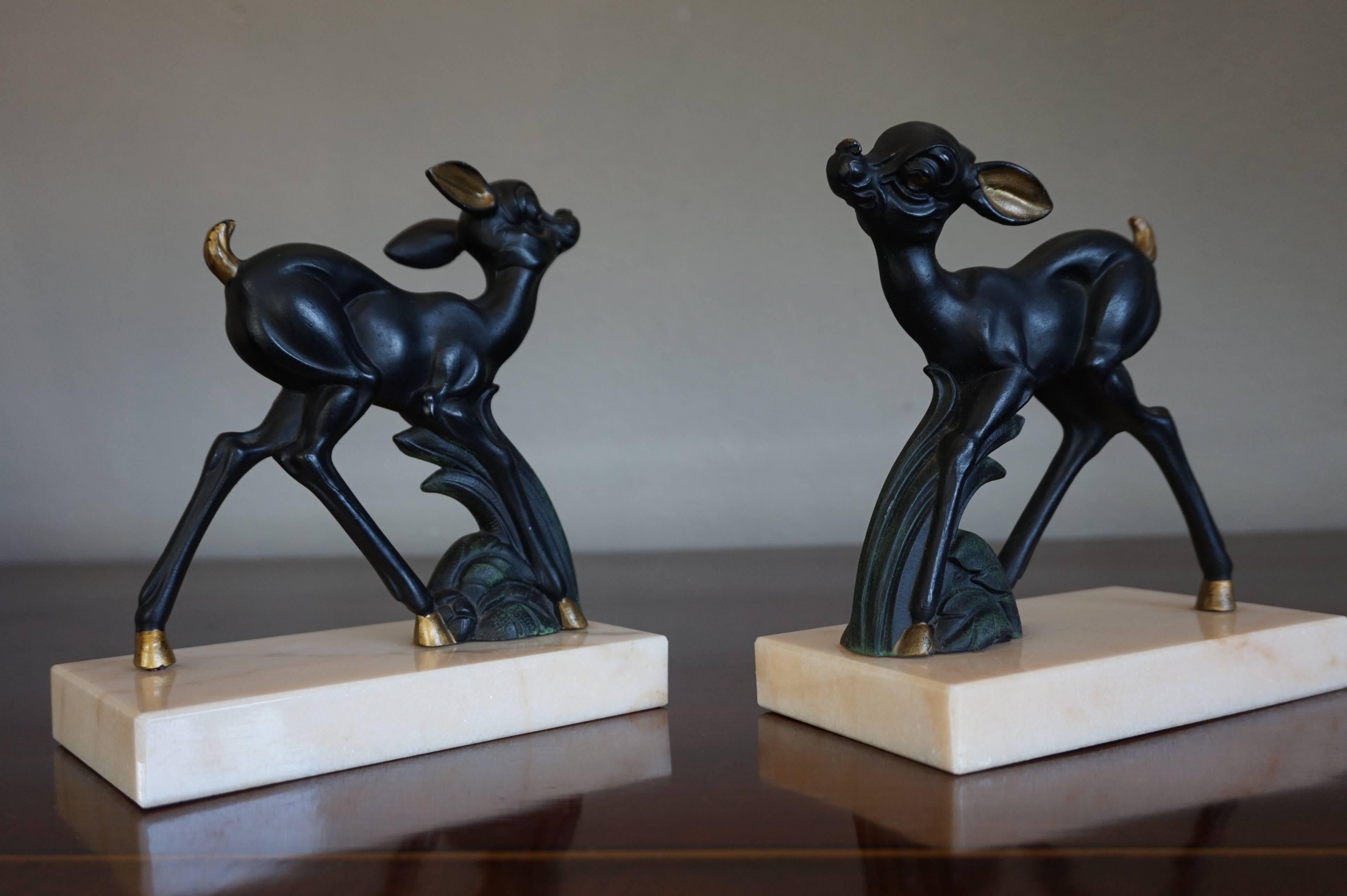 Stylized and rare 'Bambi' bookends on marble bases.

These young and hand-painted deer don't look very confident standing on all fours yet, but you can rest assure that they stand strong enough to hold up a group of your favourite books. Their