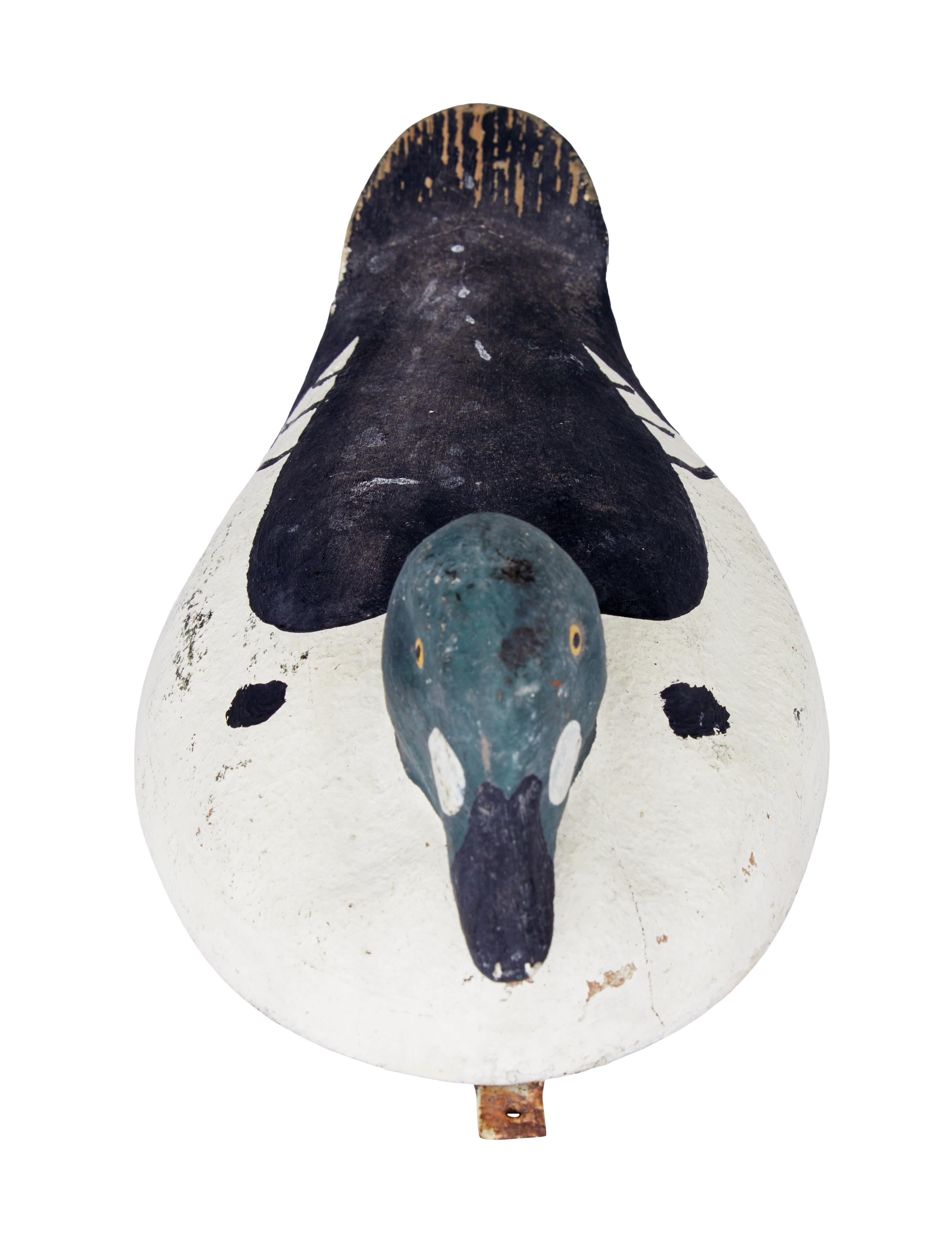 Fine quality Swedish decoy duck, circa 1920.

Wooden hollow body, hand painted in a green, black and white colour scheme. Fitted with metal bar underneath for float attachments. Labelled underneath ideal-vetter patent.

We have an extensive