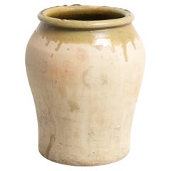 Vaso in ceramica tradizionale dipinto a mano all'inizio del XX secolo, di colore verde e rustico.