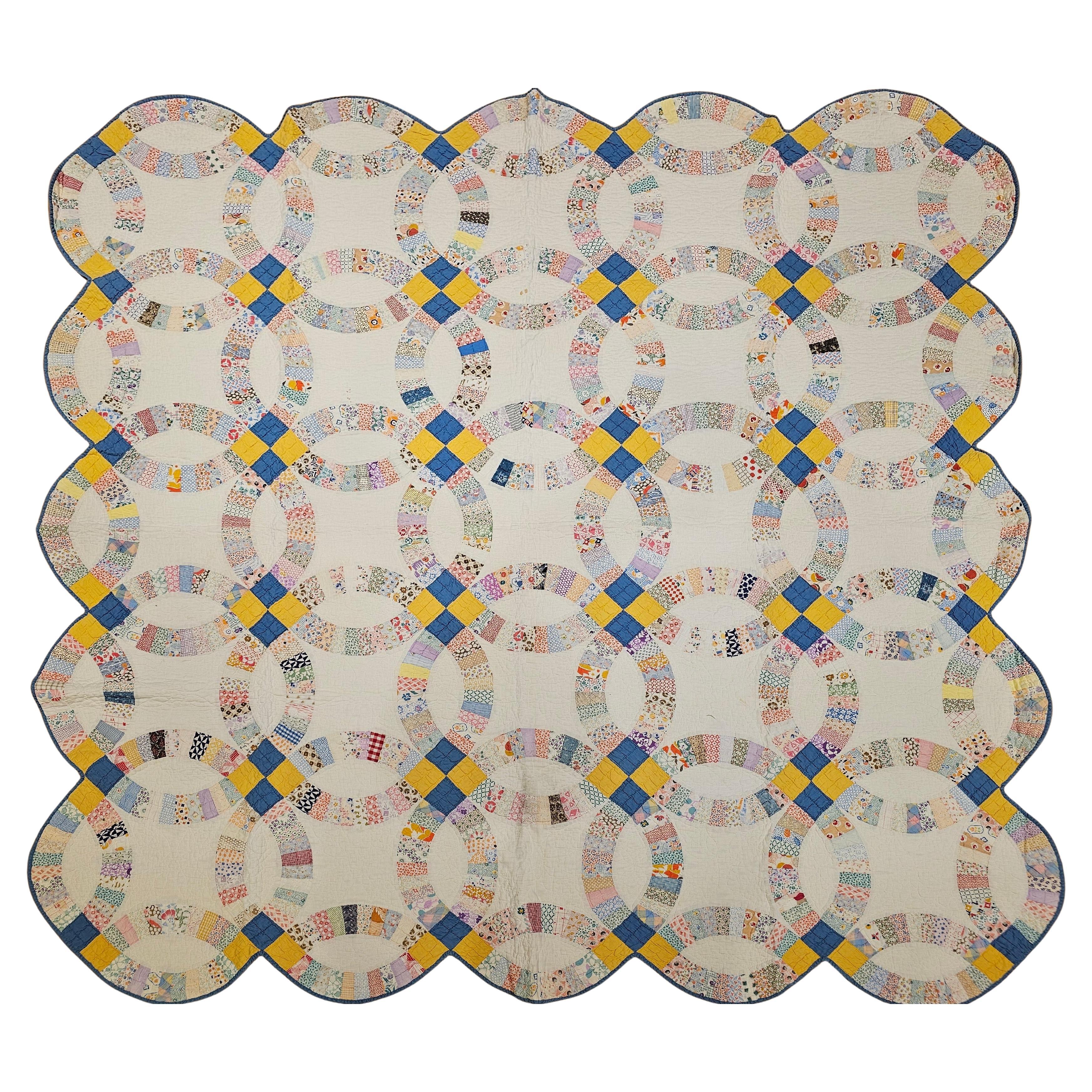Early 20th Century Hand Stitched Double Wedding Ring Pieced Quilt