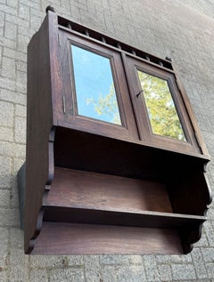 Early 20th Century Handcrafted Oak Wall Cabinet with Original Mirrored Doors
