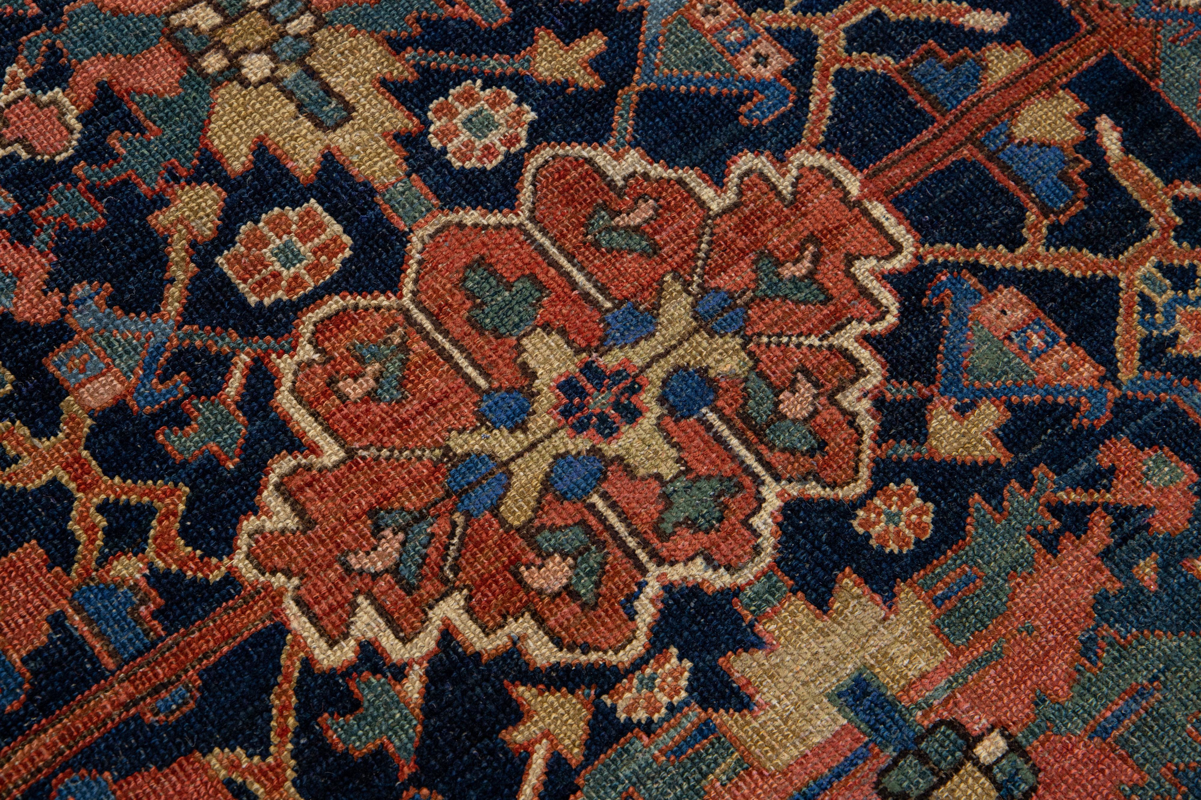 Early 20th Century Handmade Antique Blue Heriz Wool Rug with Allover Design In Good Condition For Sale In Norwalk, CT