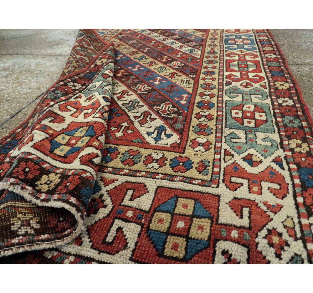 Early 20th Century Handmade Caucasian Kazak Runner with a Tribal Design For Sale 5
