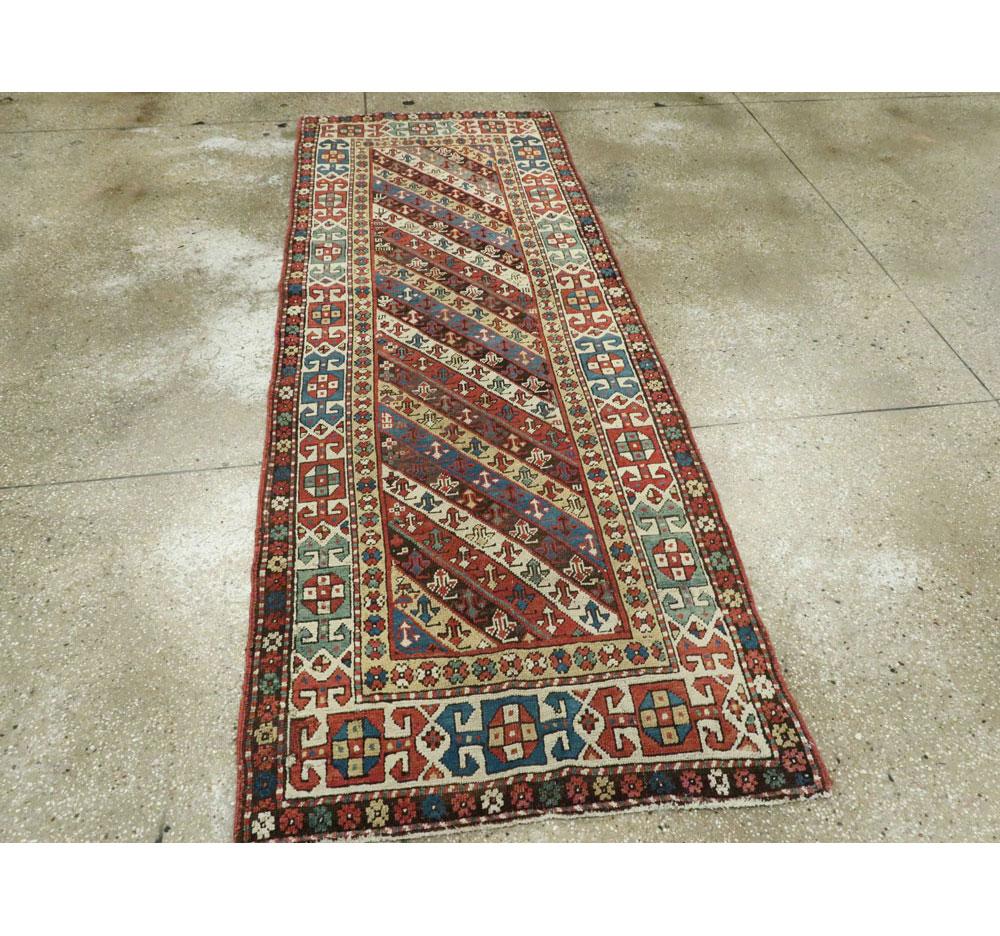 Early 20th Century Handmade Caucasian Kazak Runner with a Tribal Design For Sale 1