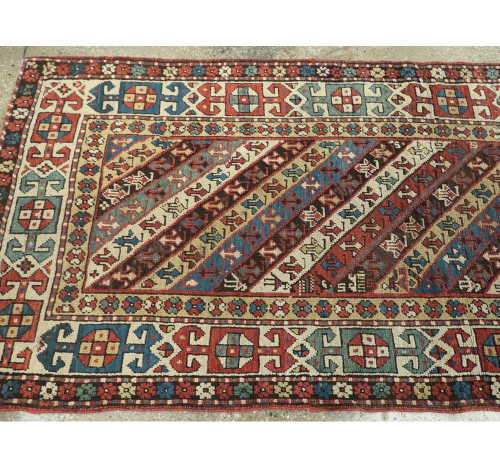 Early 20th Century Handmade Caucasian Kazak Runner with a Tribal Design For Sale 3