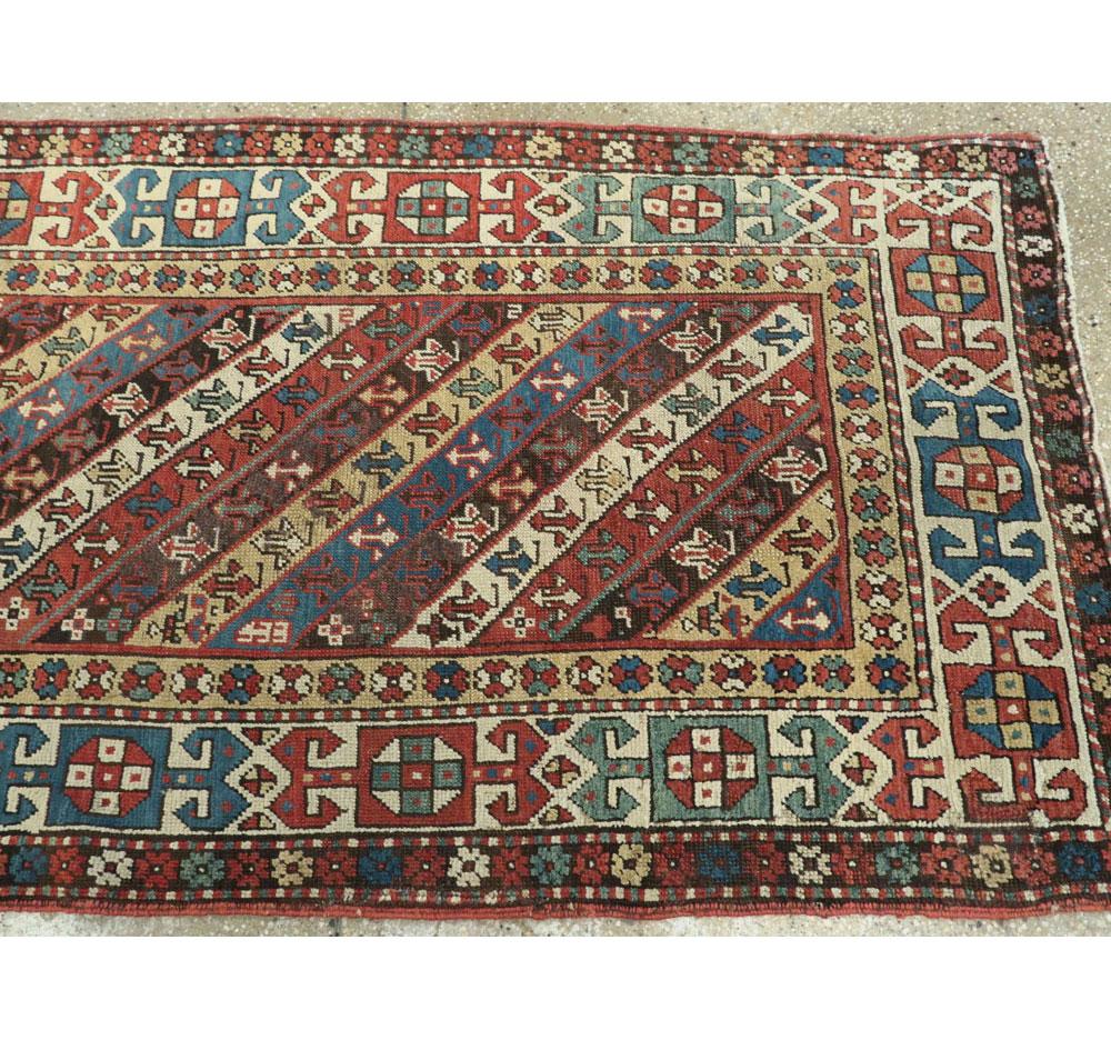 Early 20th Century Handmade Caucasian Kazak Runner with a Tribal Design For Sale 4
