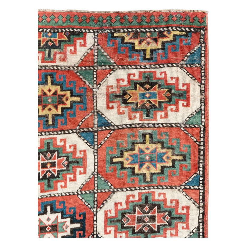 Tribal Early 20th Century Handmade Caucasian Kazak Throw Rug For Sale
