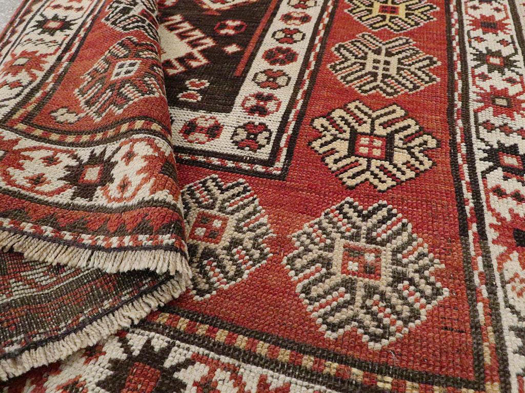 Wool Early 20th Century Handmade Caucasian Kazak Throw Rug For Sale