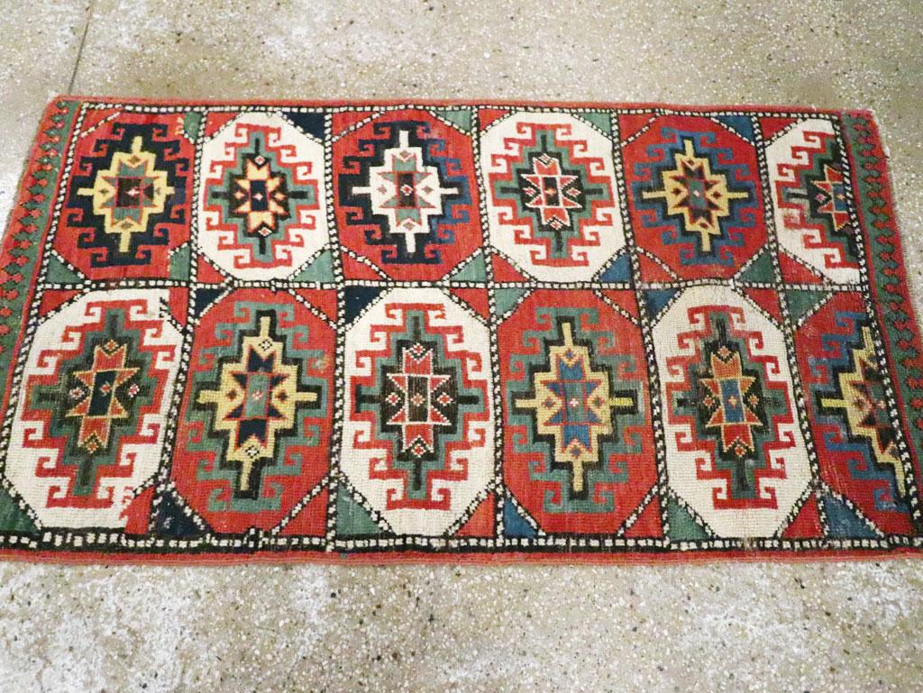 Early 20th Century Handmade Caucasian Kazak Throw Rug In Excellent Condition For Sale In New York, NY