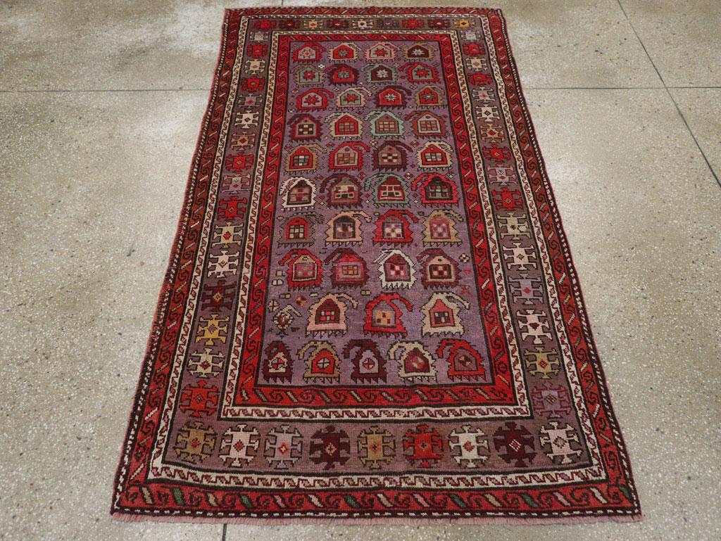 An antique Caucasian Shirvan small accent rug handmade during the early 20th century.

Measures: 3' 9