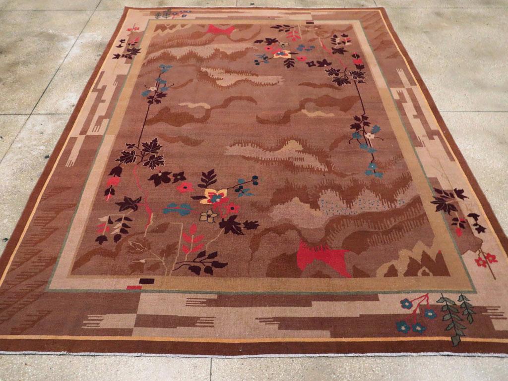 An antique Chinese Art Deco room size carpet handmade during the early 20th century.

Measures: 8' 10