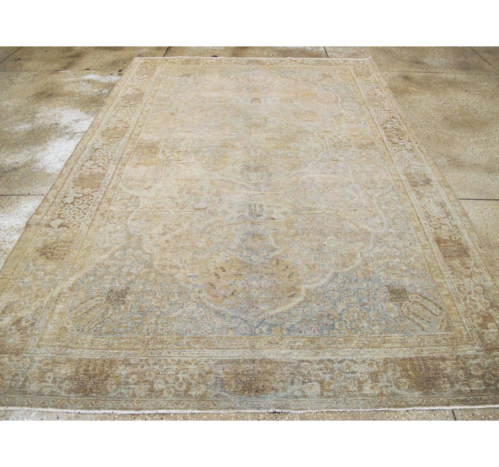 Hand-Knotted Early 20th Century Handmade Distressed Persian Tabriz Accent Rug For Sale