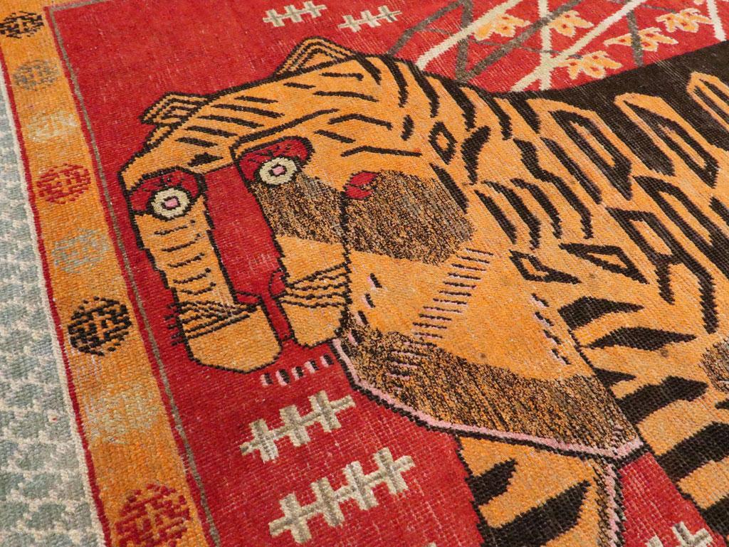 Early 20th Century Handmade East Turkestan Khotan Gallery Rug of Two Tigers In Good Condition In New York, NY