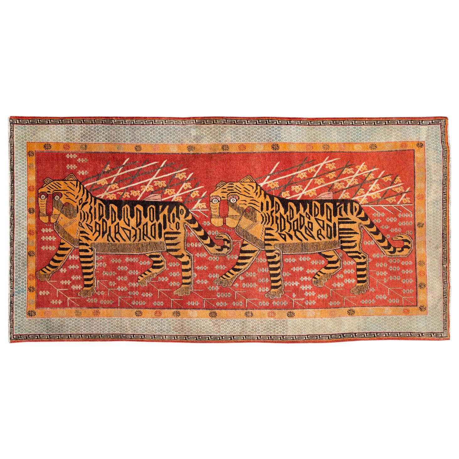 Early 20th Century Handmade East Turkestan Khotan Gallery Rug of Two Tigers