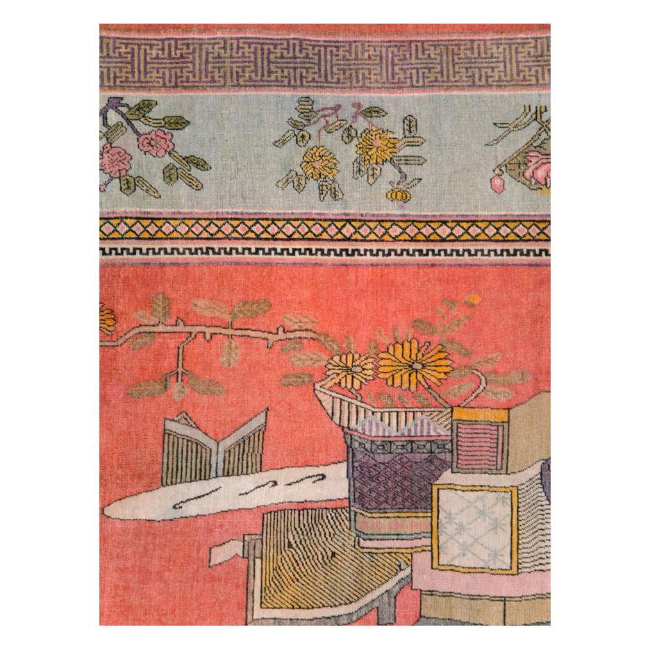 An antique East Turkestan Khotan gallery carpet handmade during the early 20th century with a pictorial vase design.

Measures: 6' 8