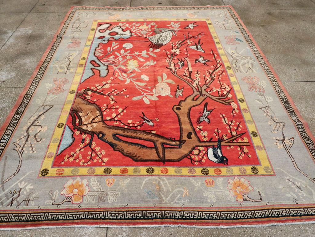 An antique East Turkestan pictorial Khotan small room size carpet handmade during the early 20th century.

Measures: 8' 2
