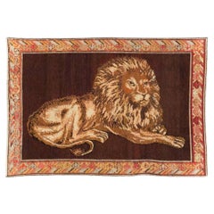 Antique Early 20th Century Handmade East Turkestan Pictorial Lion Khotan Accent Rug