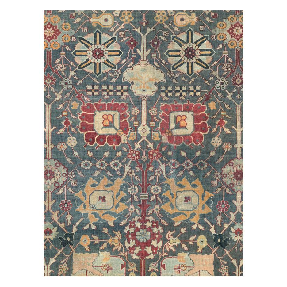 An antique Indian Agra large room size carpet in square format handmade during the early 20th century.

Measures: 13' 8