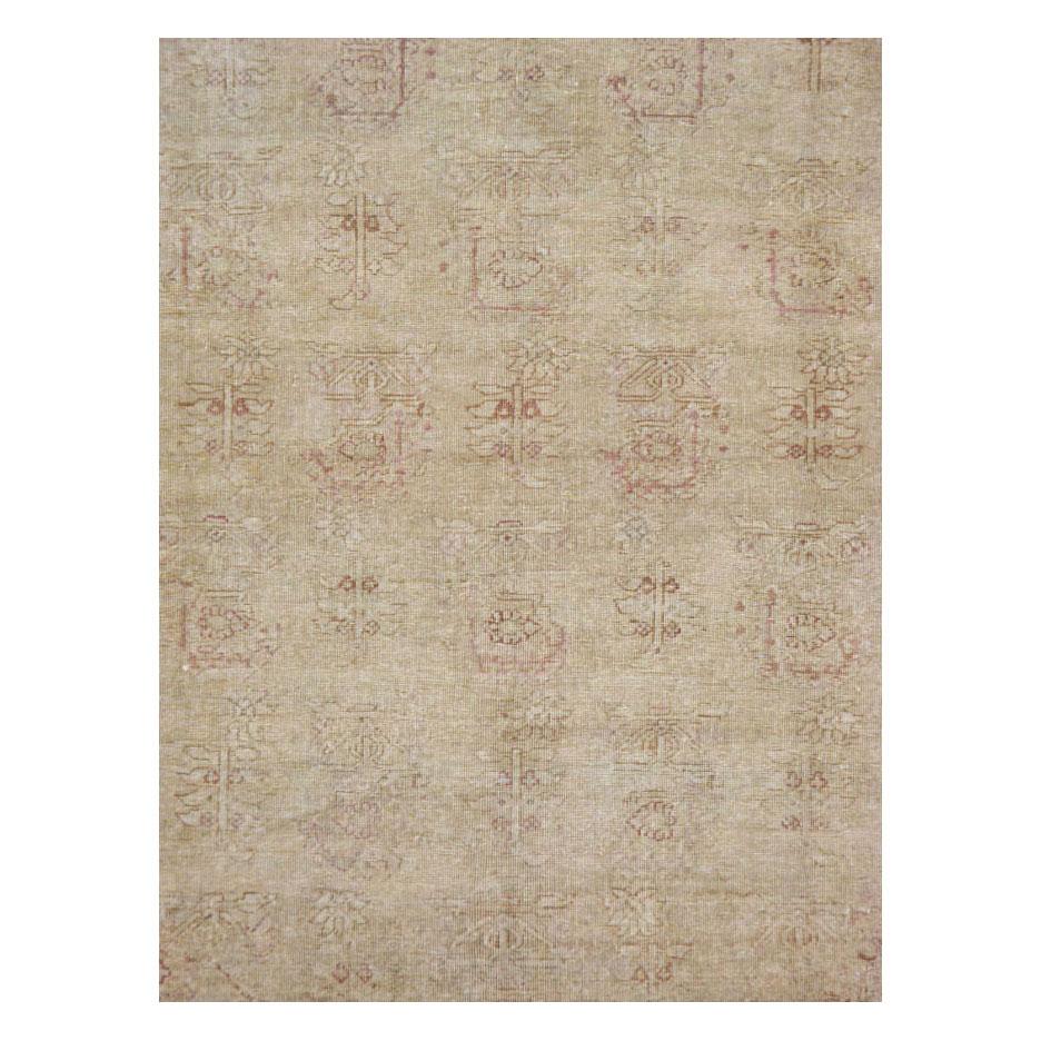 An antique Indian Amritsar small room size carpet handmade during the early 20th century in neutral earth tones including beige.

Measures: 7' 9