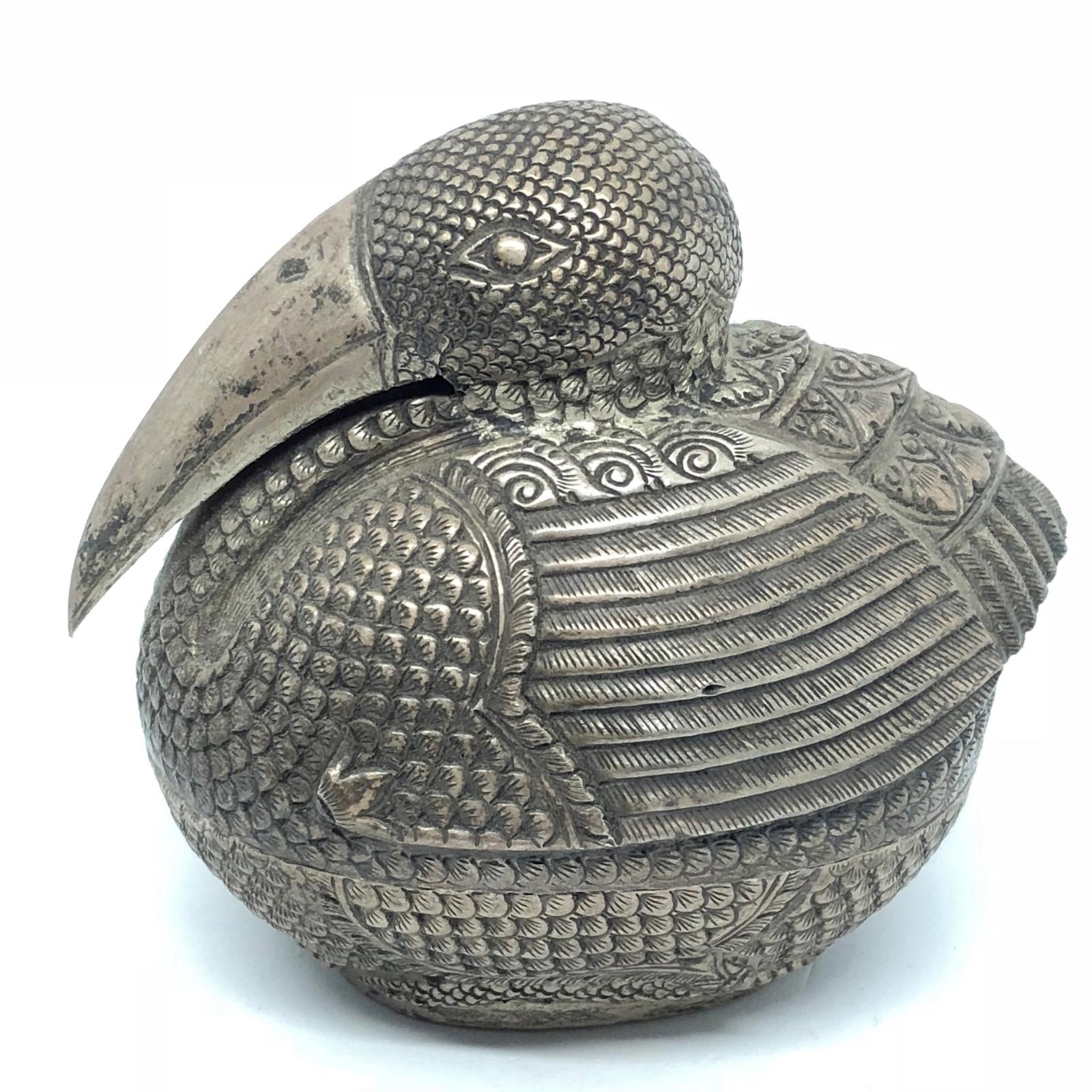 Gorgeous vintage handmade Khmer bird silver box. It was used during wedding ceremonies as a box for Betel (Piper betle) paste. It is marked T90% (900 Silver) and a sign of the silversmith. I am unsure of the age of this object and would suggest it