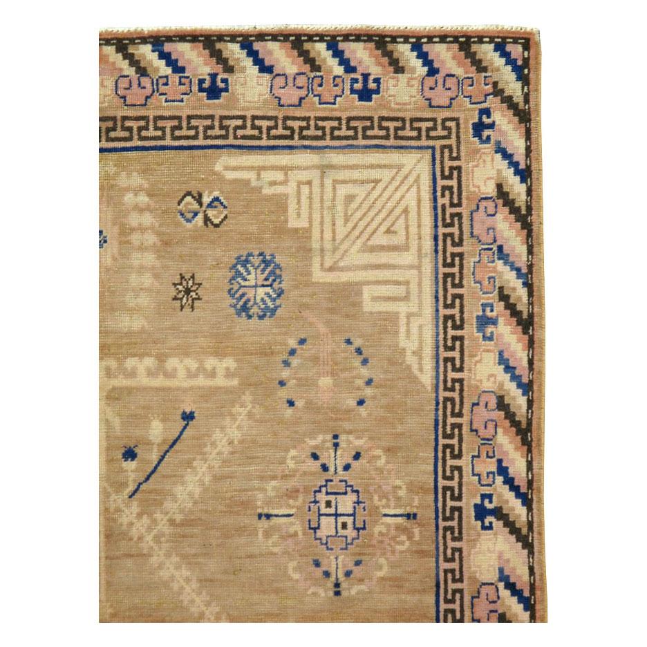 Hand-Knotted Early 20th Century Handmade Khotan 5' x 9' Light Brown Gallery Rug For Sale