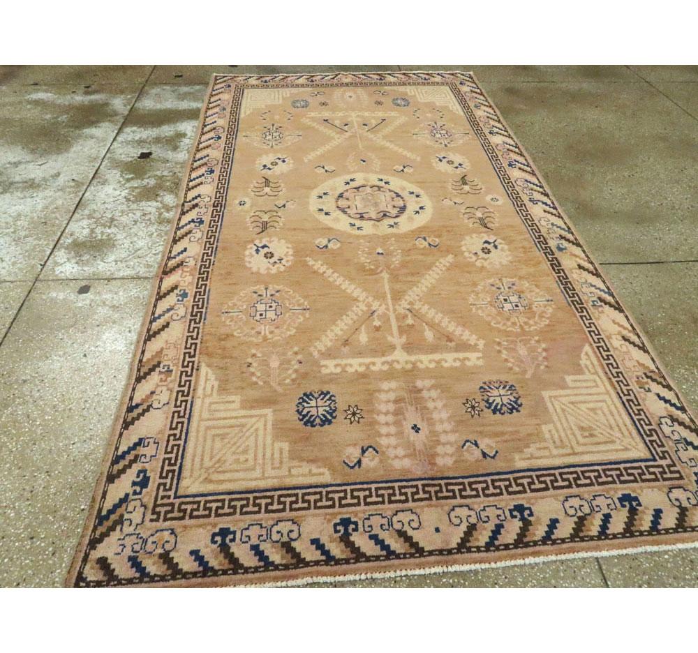 Early 20th Century Handmade Khotan 5' x 9' Light Brown Gallery Rug In Good Condition For Sale In New York, NY