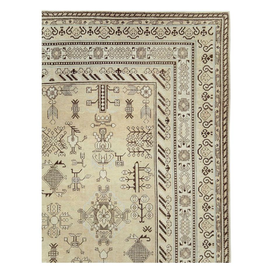 Rustic Early 20th Century Handmade Khotan Room Size Rug in Beige and Brown