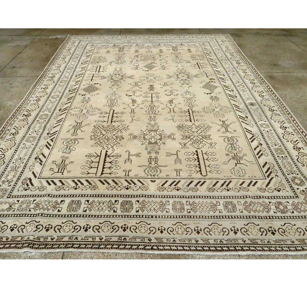 Hand-Knotted Early 20th Century Handmade Khotan Room Size Rug in Beige and Brown