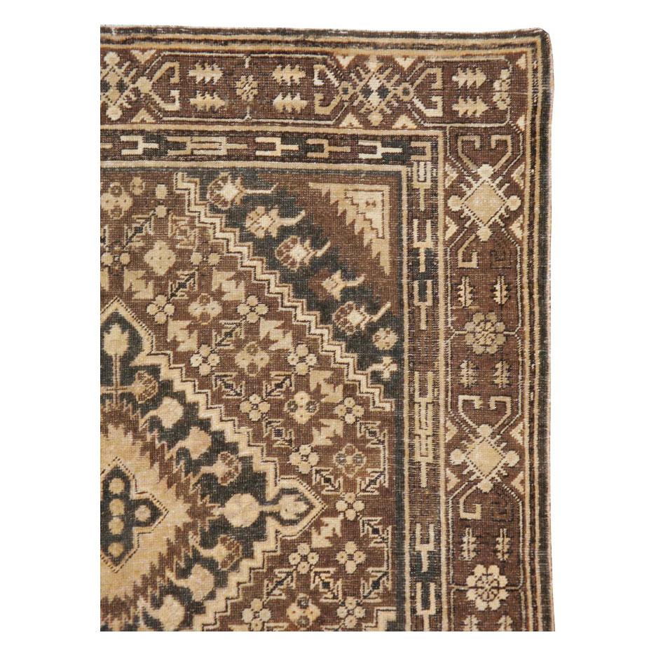 East Turkestani Early 20th Century Handmade Khotan Accent Rug in Brown For Sale