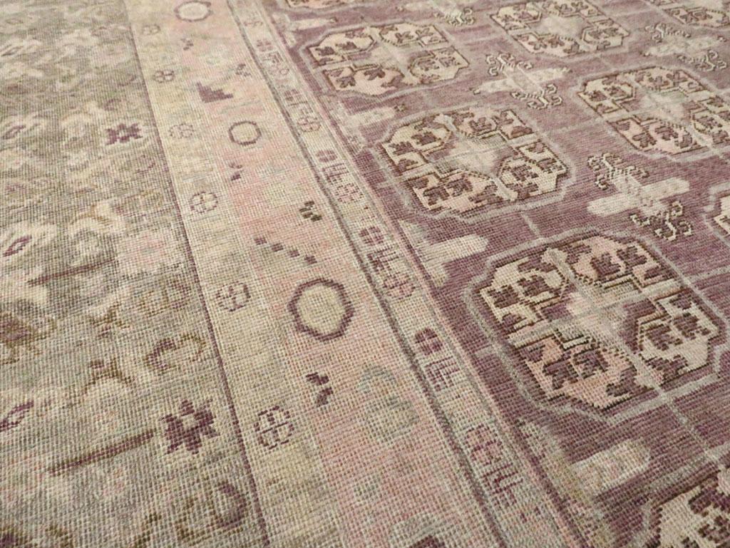Hand-Knotted Early 20th Century Handmade Khotan Square Room Size Carpet in Green and Purple For Sale