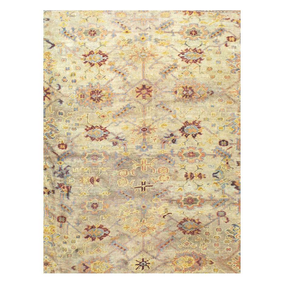 An antique Turkish Oushak large room size carpet in square format handmade during the early 20th century.

Measures: 13' 1