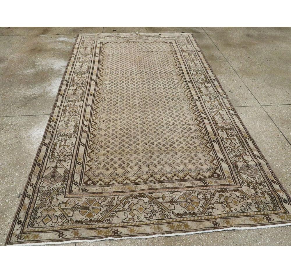 Hand-Knotted Early 20th Century Handmade Persian 5' x 9' Gallery Accent Rug in Neutral Tones For Sale