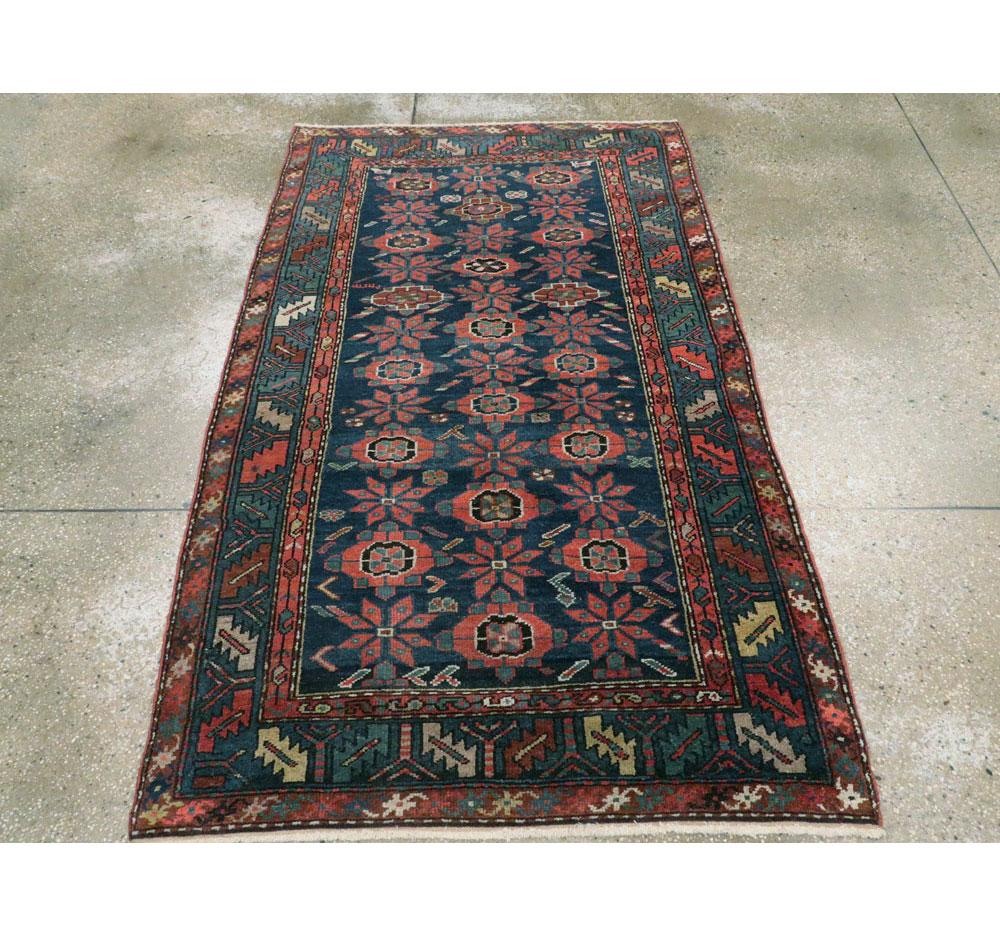 Hand-Knotted Early 20th Century Handmade Persian Accent Rug in Dark Blue, Green and Light Red For Sale