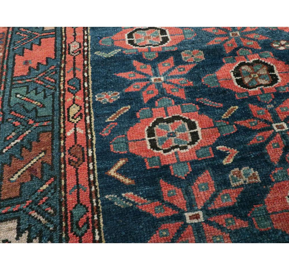 Wool Early 20th Century Handmade Persian Accent Rug in Dark Blue, Green and Light Red For Sale