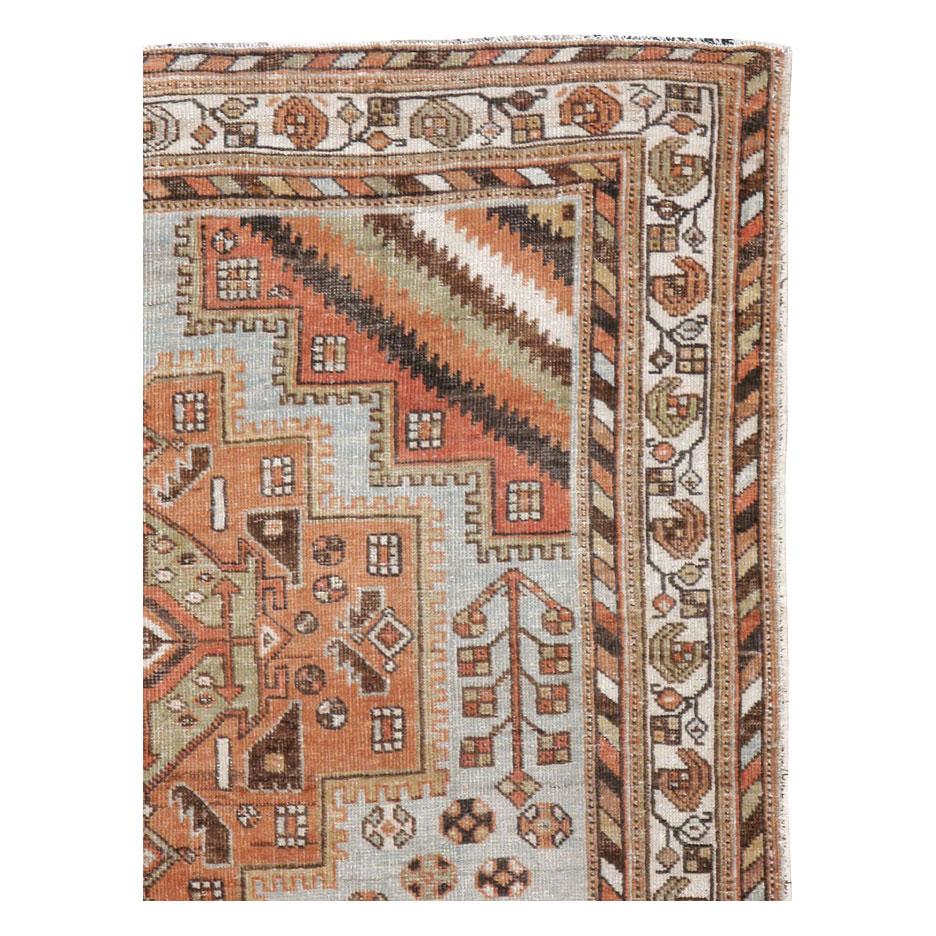 An antique Persian Afshar tribal accent rug handmade during the early 20th century.

Measures: 4' 6