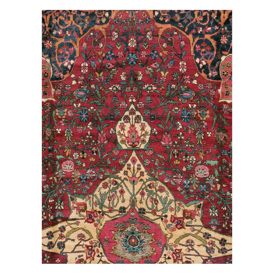An antique Persian room size carpet handmade by the Bakhtiari tribe during the mid-20th century. Formal design, yet offset and quirky due to its tribal nature.

Measures: 12' 4