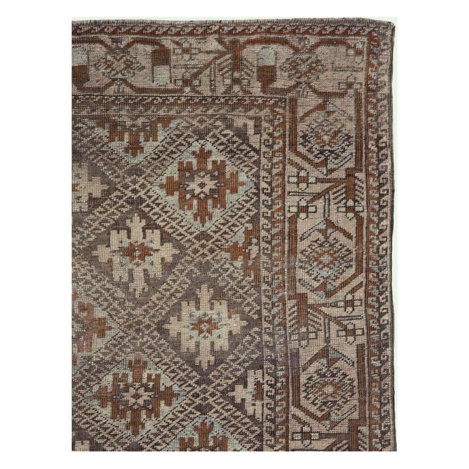 An antique Persian tribal rug handmade during the early 20th century by the Baluchi tribes in Persia.

Measures: 3' 6