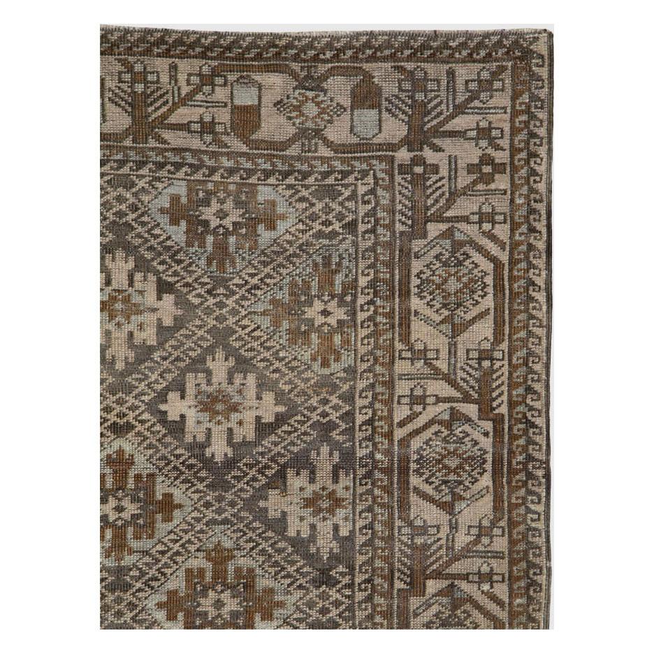 Rustic Early 20th Century Handmade Persian Baluch Tribal Rug For Sale