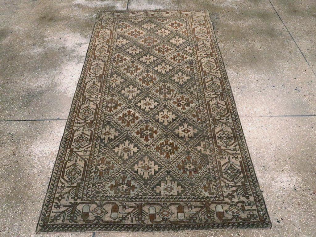 Hand-Knotted Early 20th Century Handmade Persian Baluch Tribal Rug For Sale