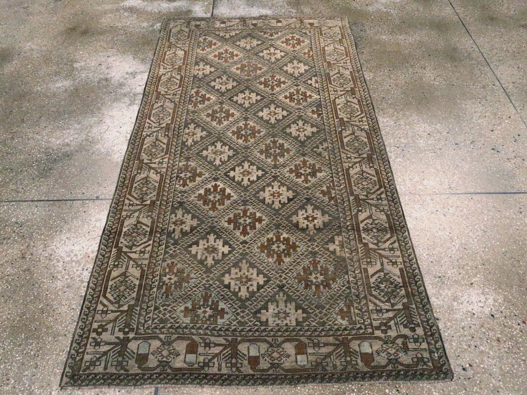 Anfang des 20. Jahrhunderts handgefertigter persischer Belutsch-Stammes-Teppich (Rustikal) im Angebot