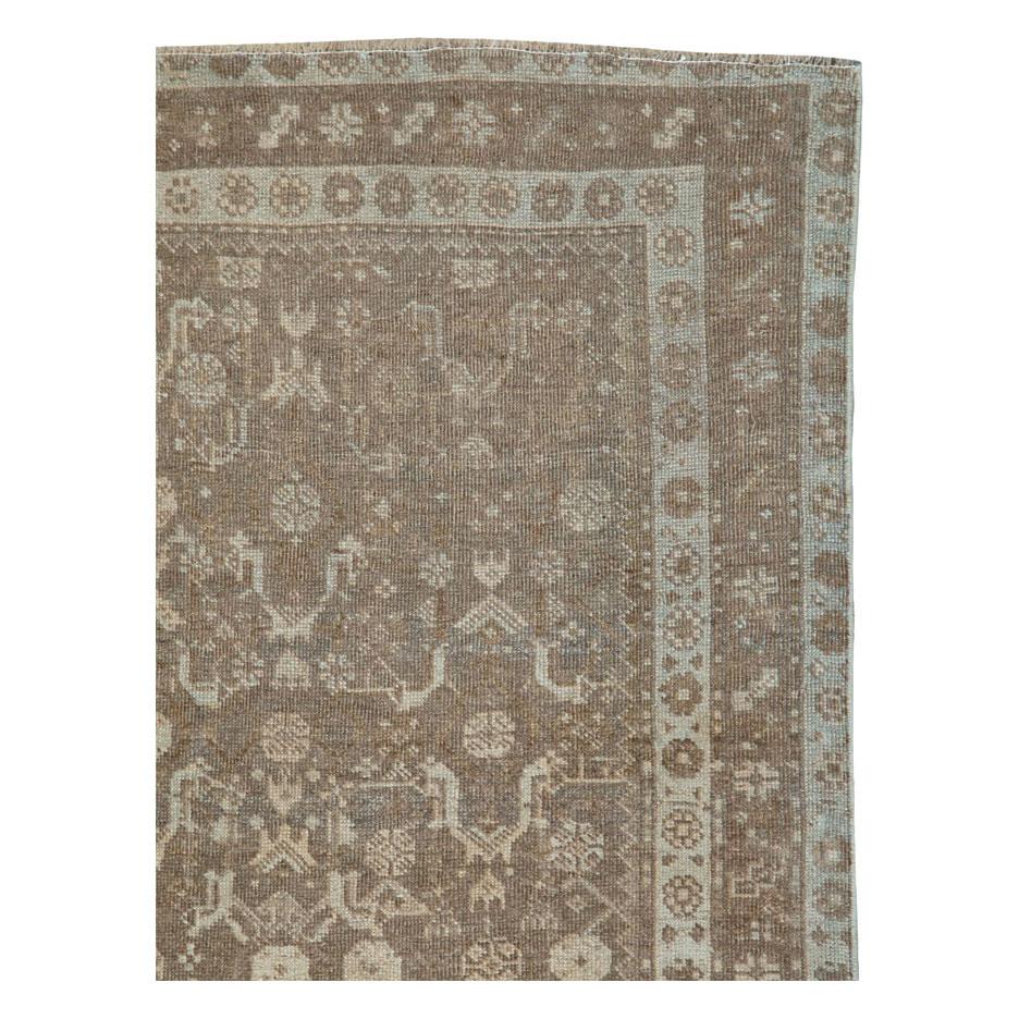 An antique Persian Bidjar accent rug handmade during the early 20th century.

Measures: 4' 0