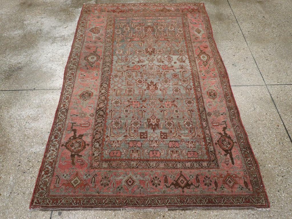 An antique Persian Bidjar accent rug handmade during the early 20th century.

Measures: 4' 3