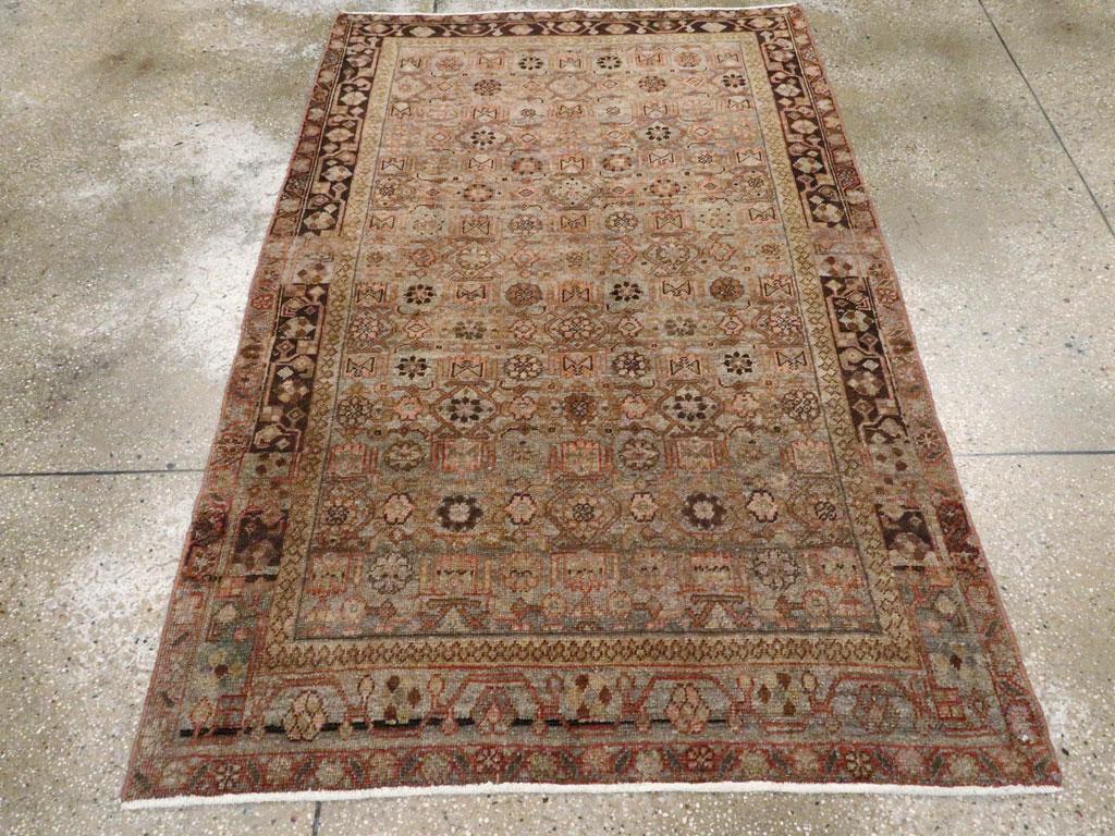 An antique Persian Bidjar small accent rug handmade during the early 20th century.

Measures: 4' 1