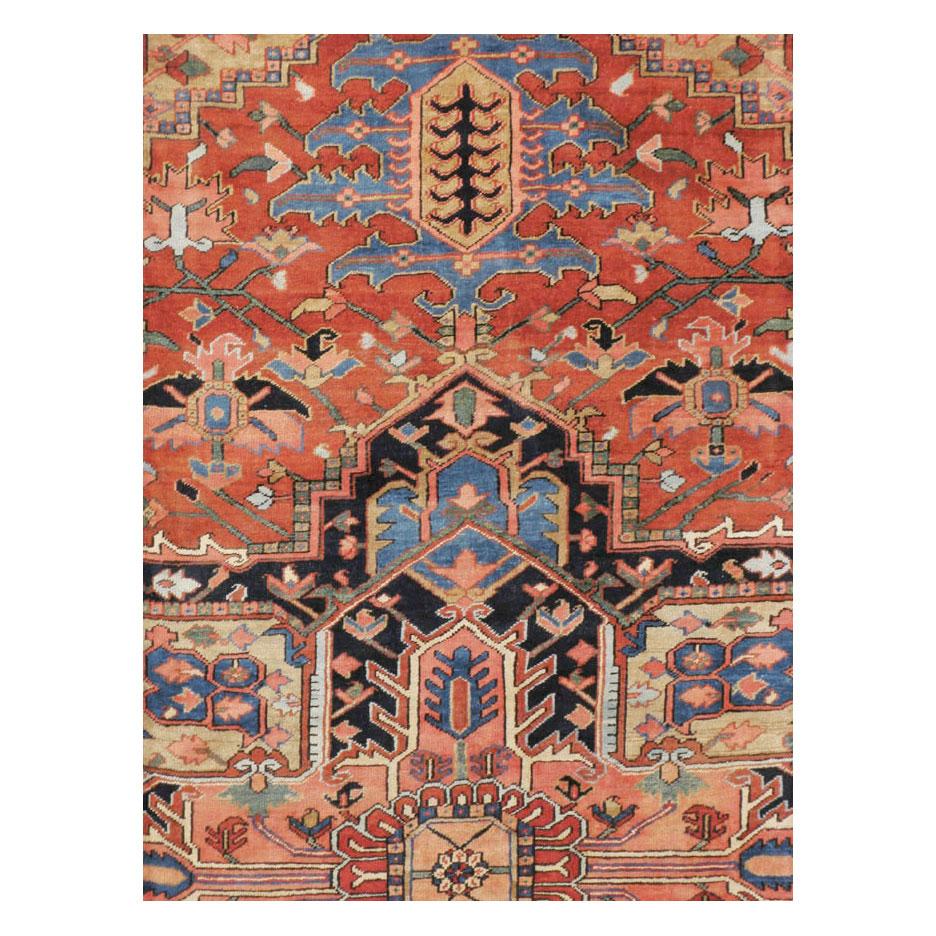 An antique Persian Heriz large room size rug handmade during the early 20th century.

Measures: 11' 8