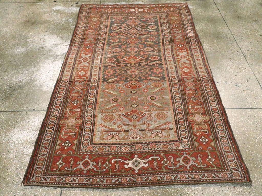 An antique Persian Kurd accent rug handmade during the early 20th century.

Measures: 4' 4