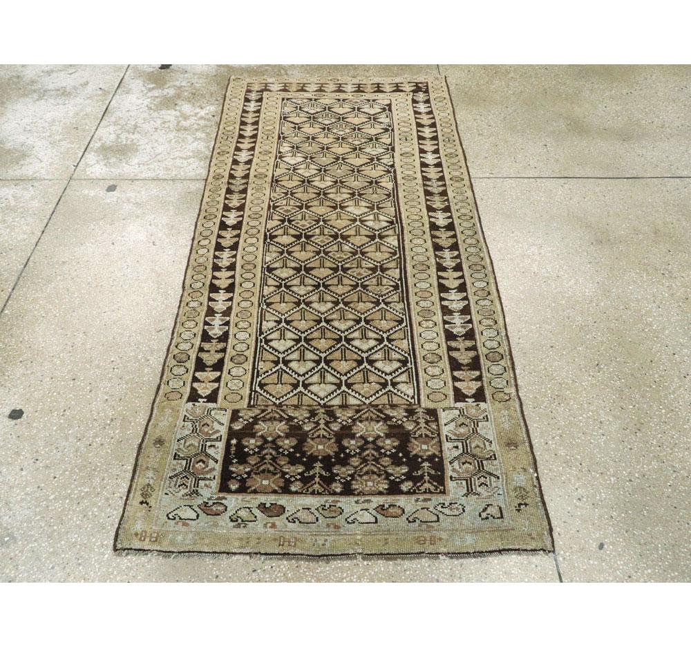 Hand-Knotted Early 20th Century Handmade Persian Kurd Runner in Earth Tones For Sale