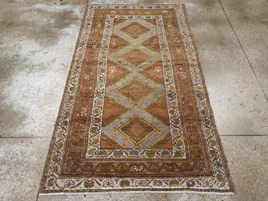 An antique Persian Kurd throw rug handmade during the early 20th century.

Measures: 3' 5