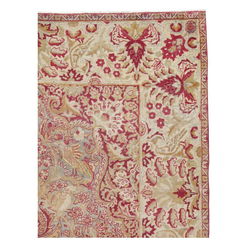 An antique Persian Lavar Kerman accent rug handmade during the early 20th century.

Measures: 4' 6