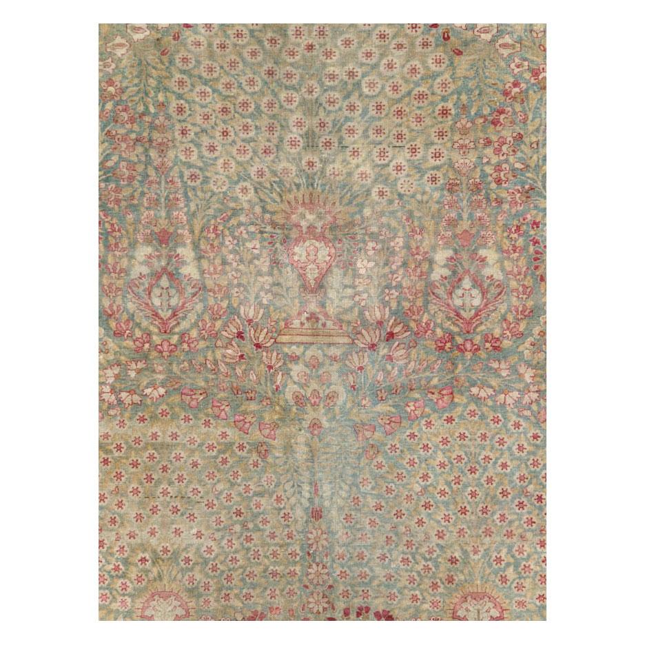An antique Persian Lavar Kerman gallery carpet handmade during the early 20th century.

Measures: 6' 7